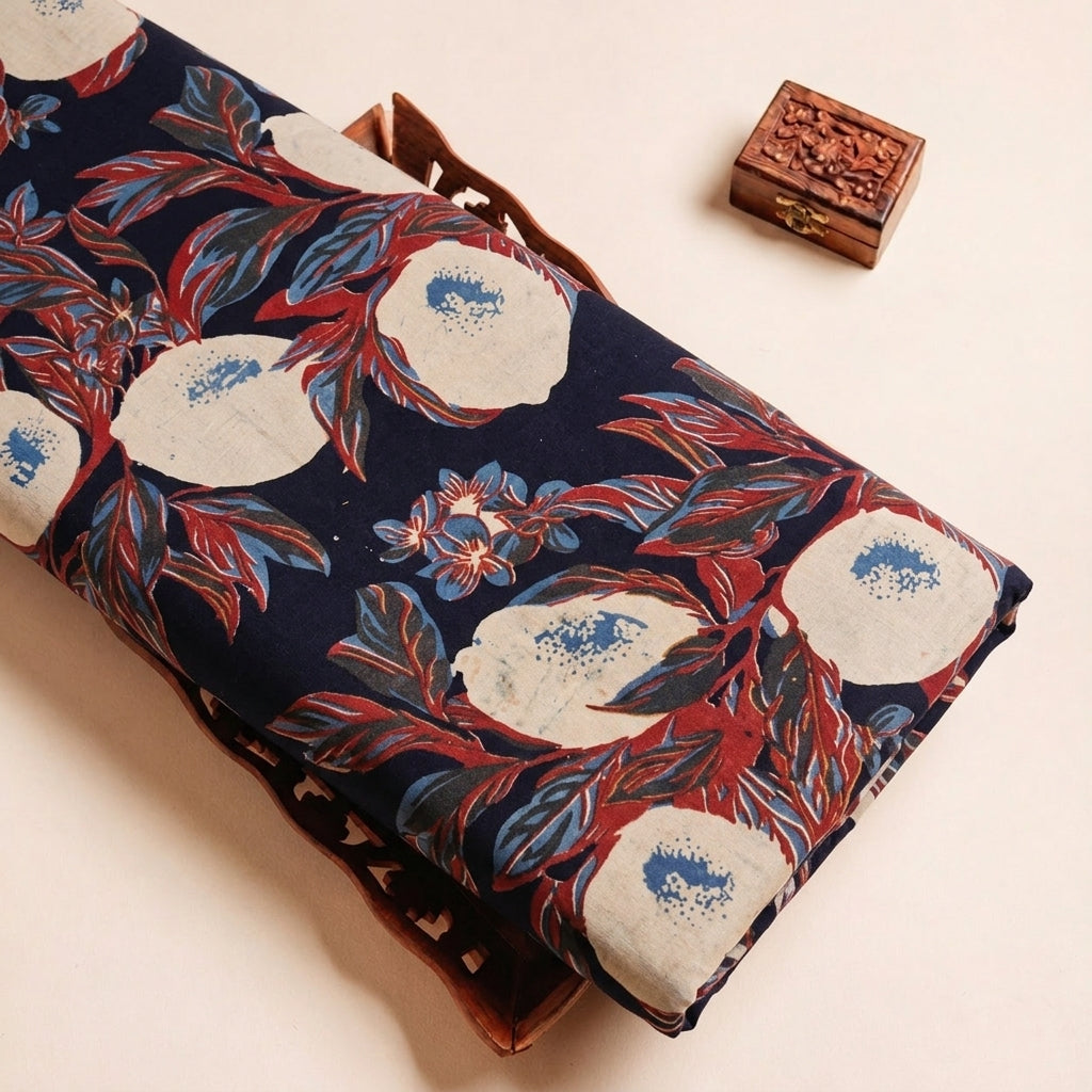 Folded Blue Ajrakh Cotton Fabric Highlighting Floral and Texture