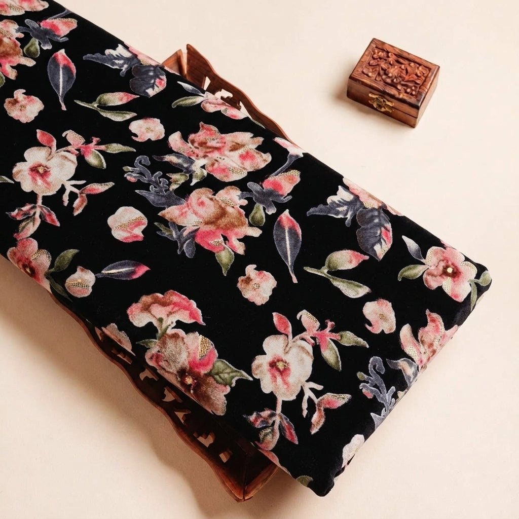 Folded Black Foil Print Rayon Fabric Highlighting Floral and Texture