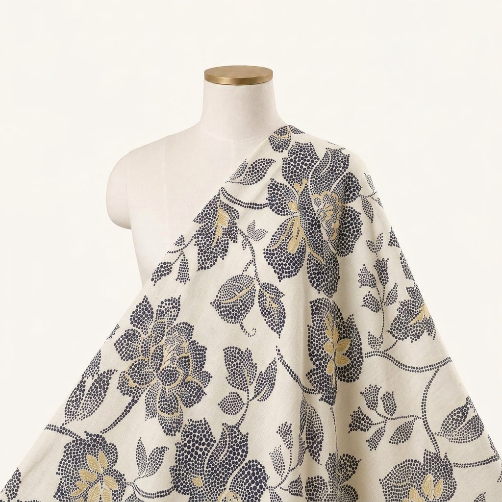Foil Print Cream Foil Print Rayon Fabric Draped as a saree