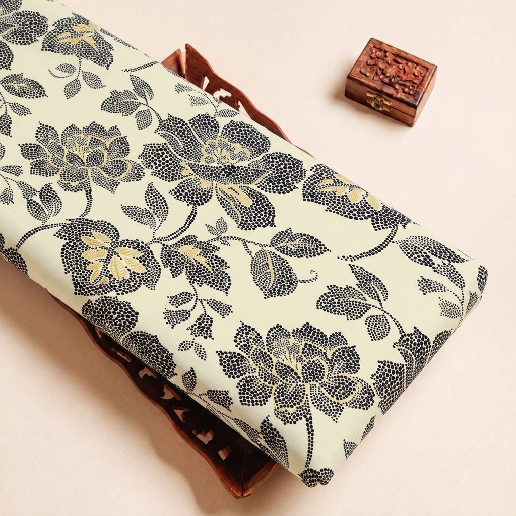 Folded Cream Foil Print Rayon Fabric Highlighting Leaf and Texture