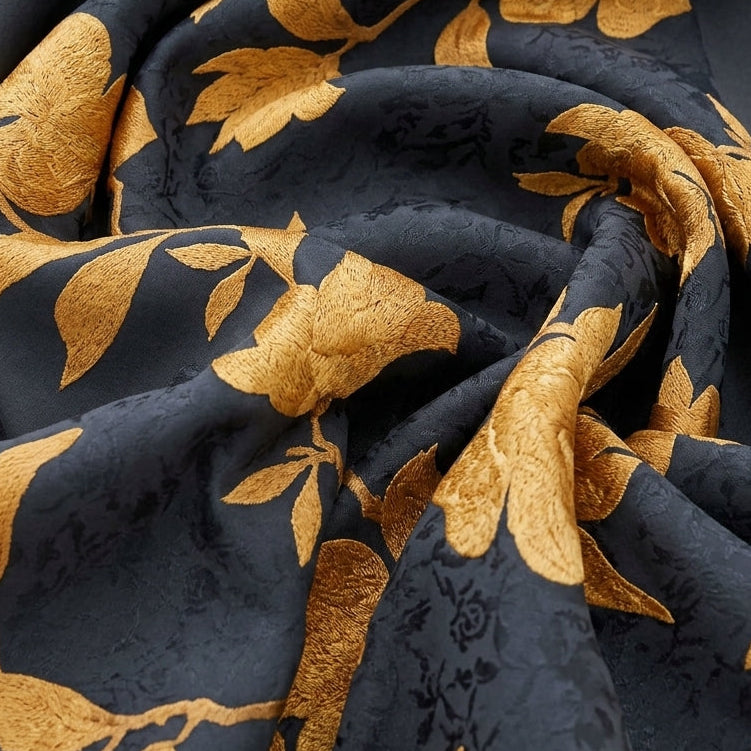 Swirled Black Floral Satin Fabric Showing Drape