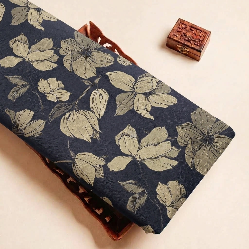 Folded Black Floral Satin Fabric Highlighting Texture