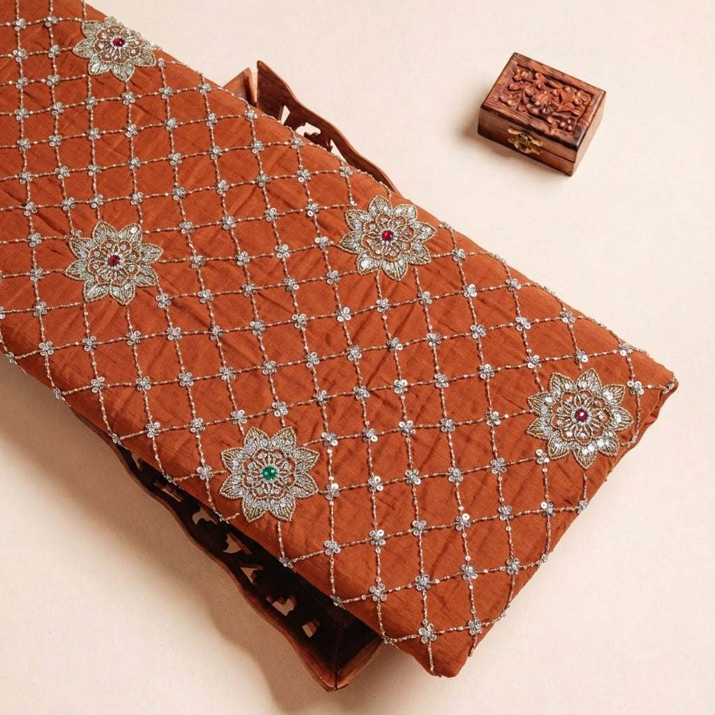 Folded Orange Embroidery Crepe Fabric Highlighting Thread Work Stone Sequin and Texture