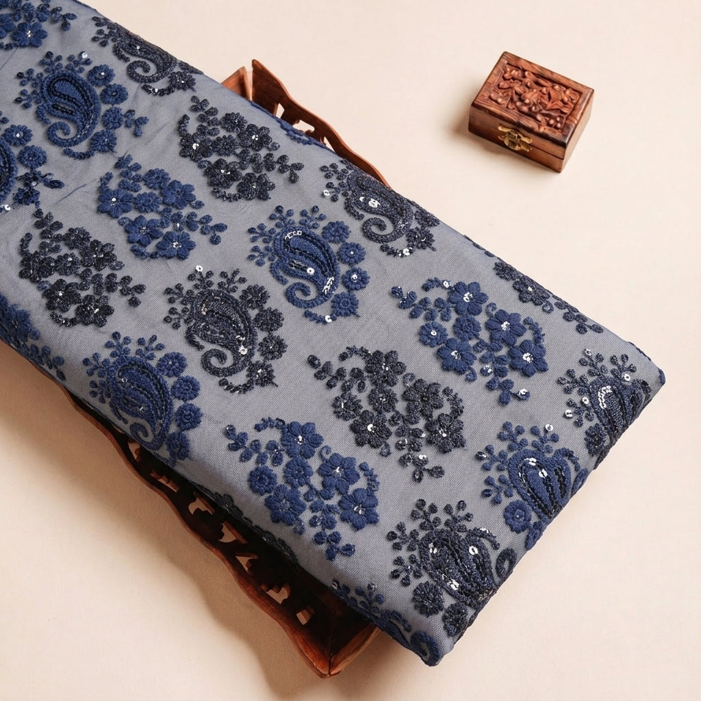 Folded Blue Embroidery Georgette Fabric Highlighting Paisley Floral Sequin and Texture