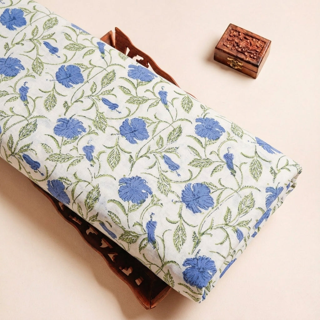 Folded White Blue Floral Linen Fabric Highlighting and Texture