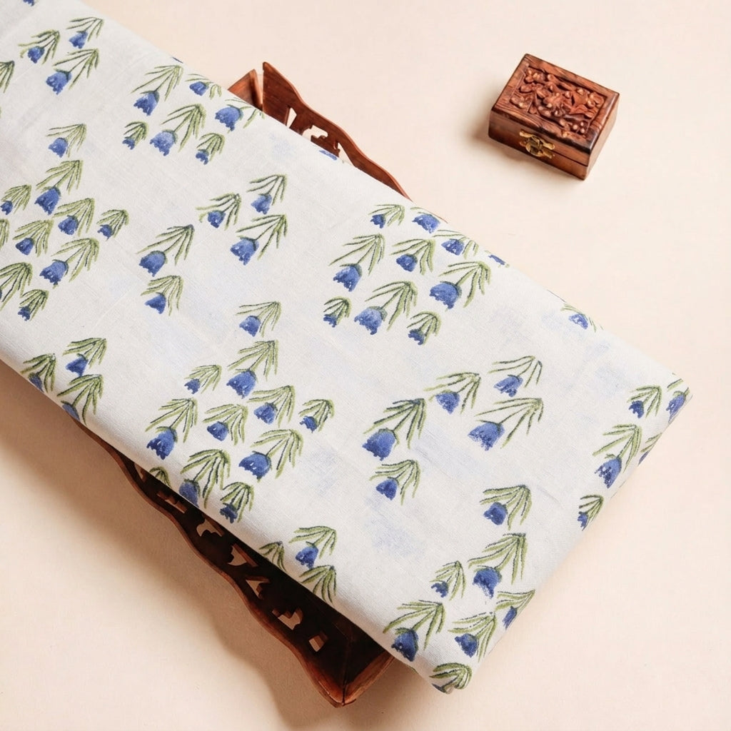Folded White Blue Floral Linen Fabric Highlighting and Texture