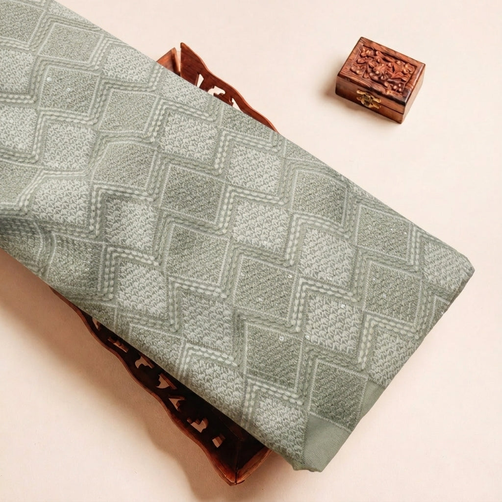 Folded Green Embroidery Georgette Fabric Highlighting Sequin Diamond and Texture
