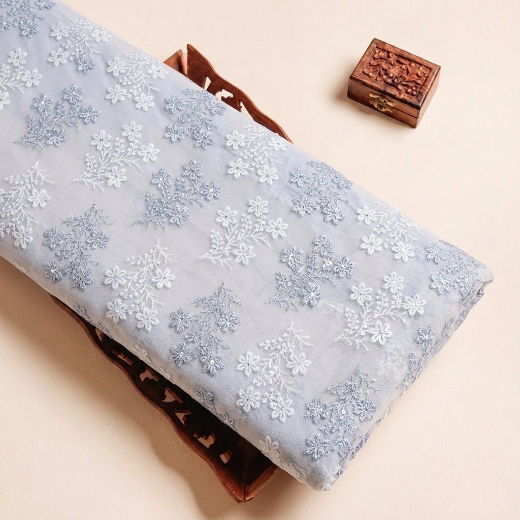 Folded Ash Blue Embroidery Georgette Fabric Highlighting Sequin Floral and Texture