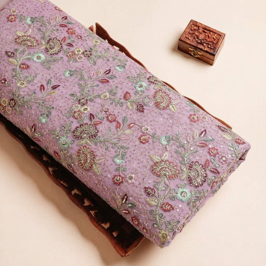 Folded Dusty Pink Embroidery Georgette Fabric Highlighting Stone Sequin Thread work and Texture