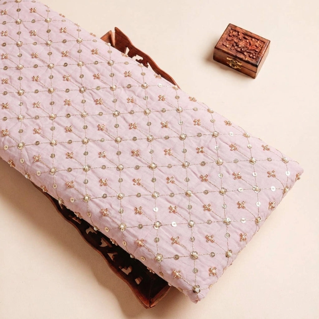 Folded Baby Pink Embroidery Crepe Fabric Highlighting and Texture