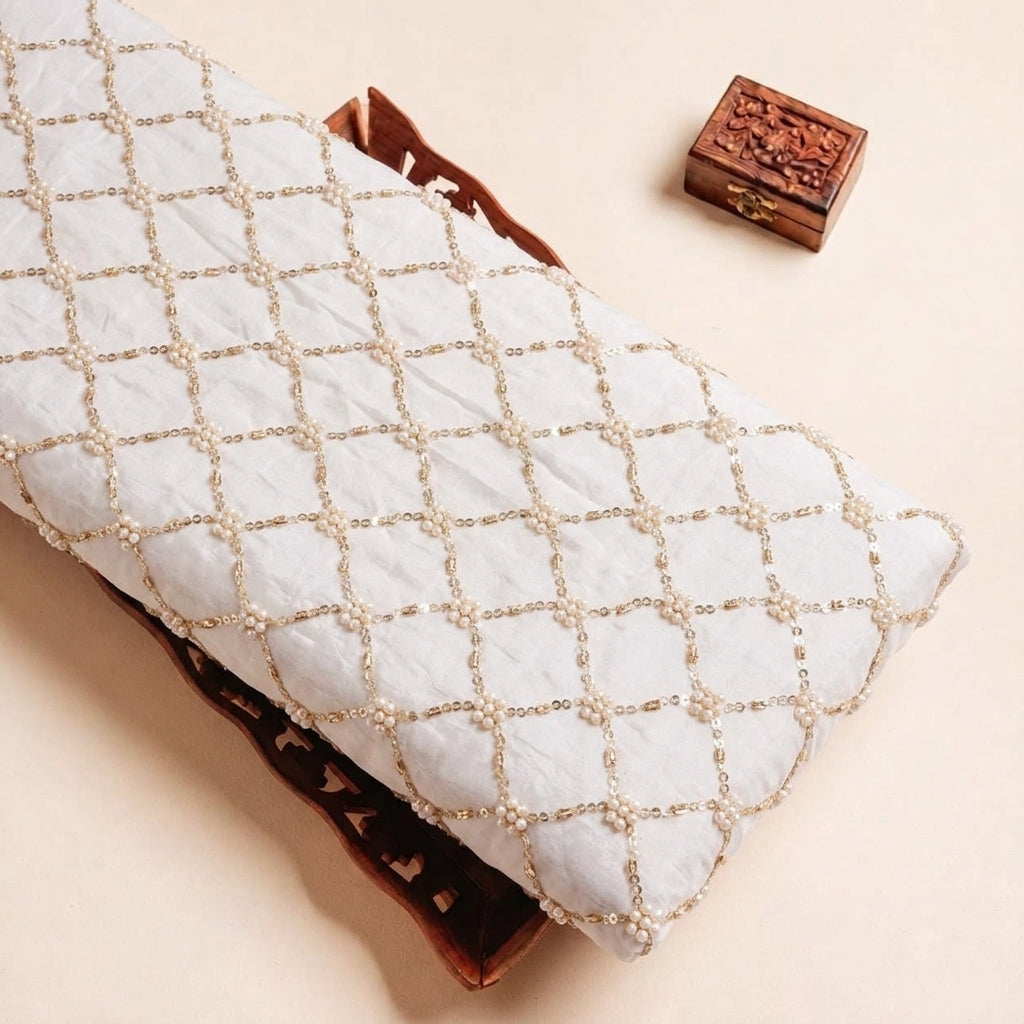 Folded White Embroidery Crepe Fabric Highlighting and Texture