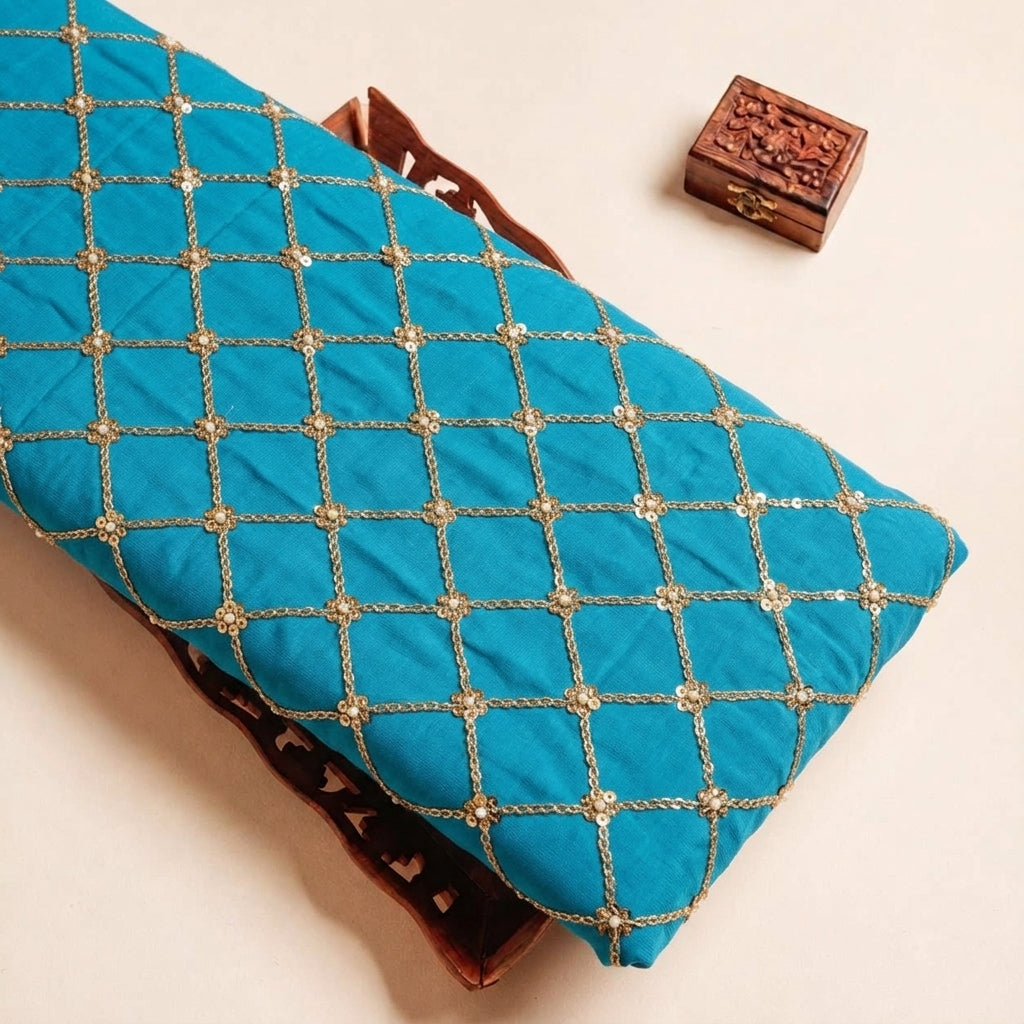 Folded Blue Embroidery Crepe Fabric Highlighting and Texture