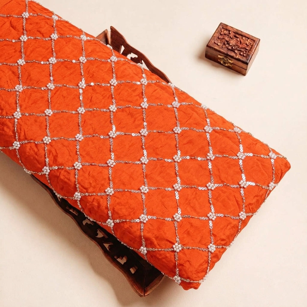 Folded Dark Orange Embroidery Crepe Fabric Highlighting and Texture