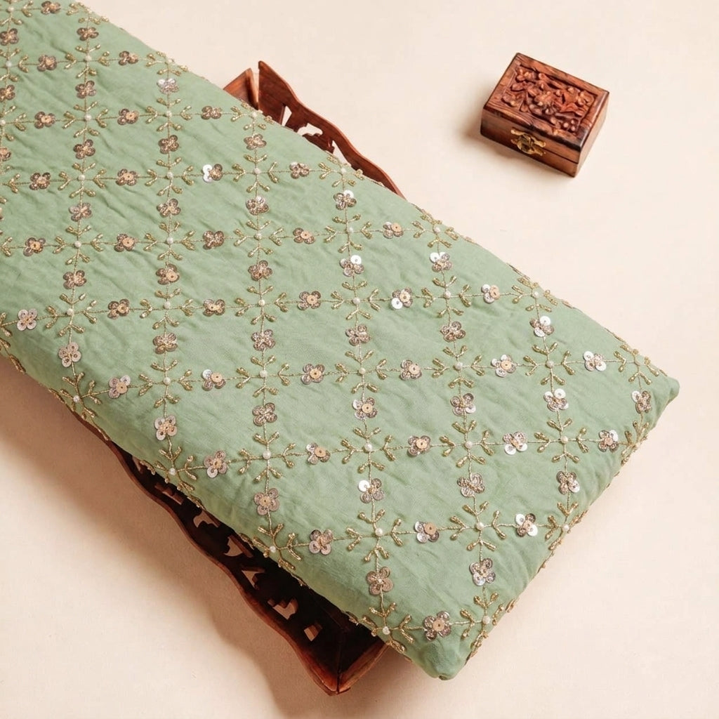 Folded Green Embroidery Crepe Fabric Highlighting and Texture