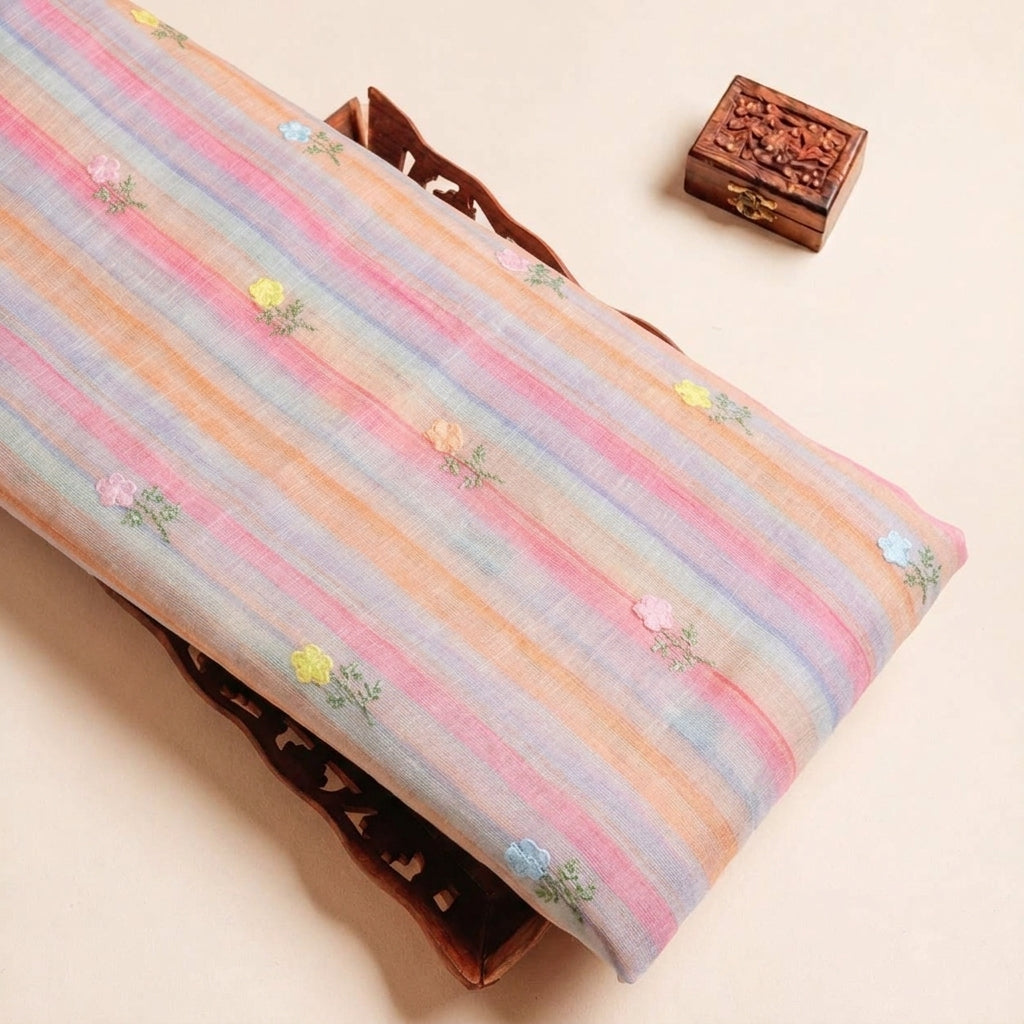 Folded Pink Embroidery Linen Fabric Highlighting Floral Thread work and Texture