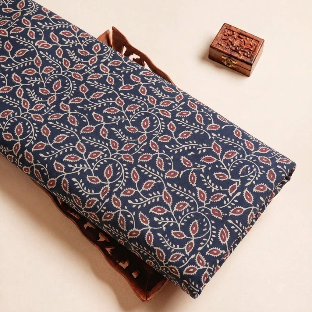 Folded Black Ajrakh Modal Silk Fabric Highlighting Block Print and Texture