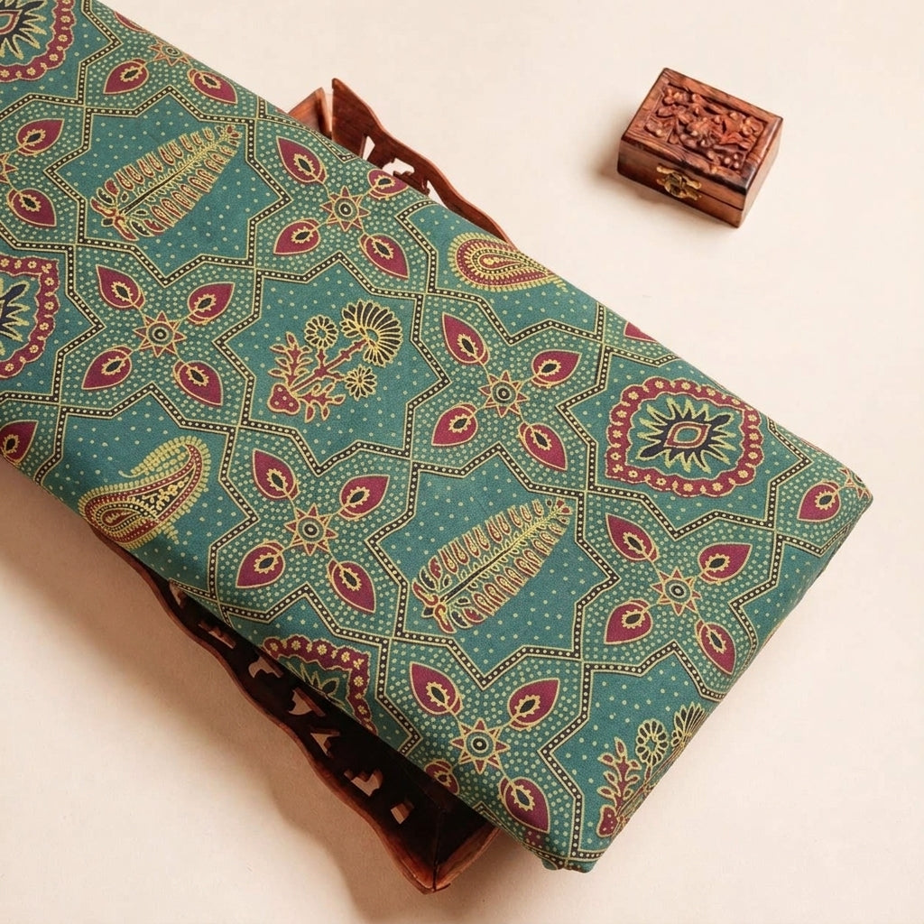 Folded Green Ajrakh Modal Silk Fabric Highlighting Block Print and Texture