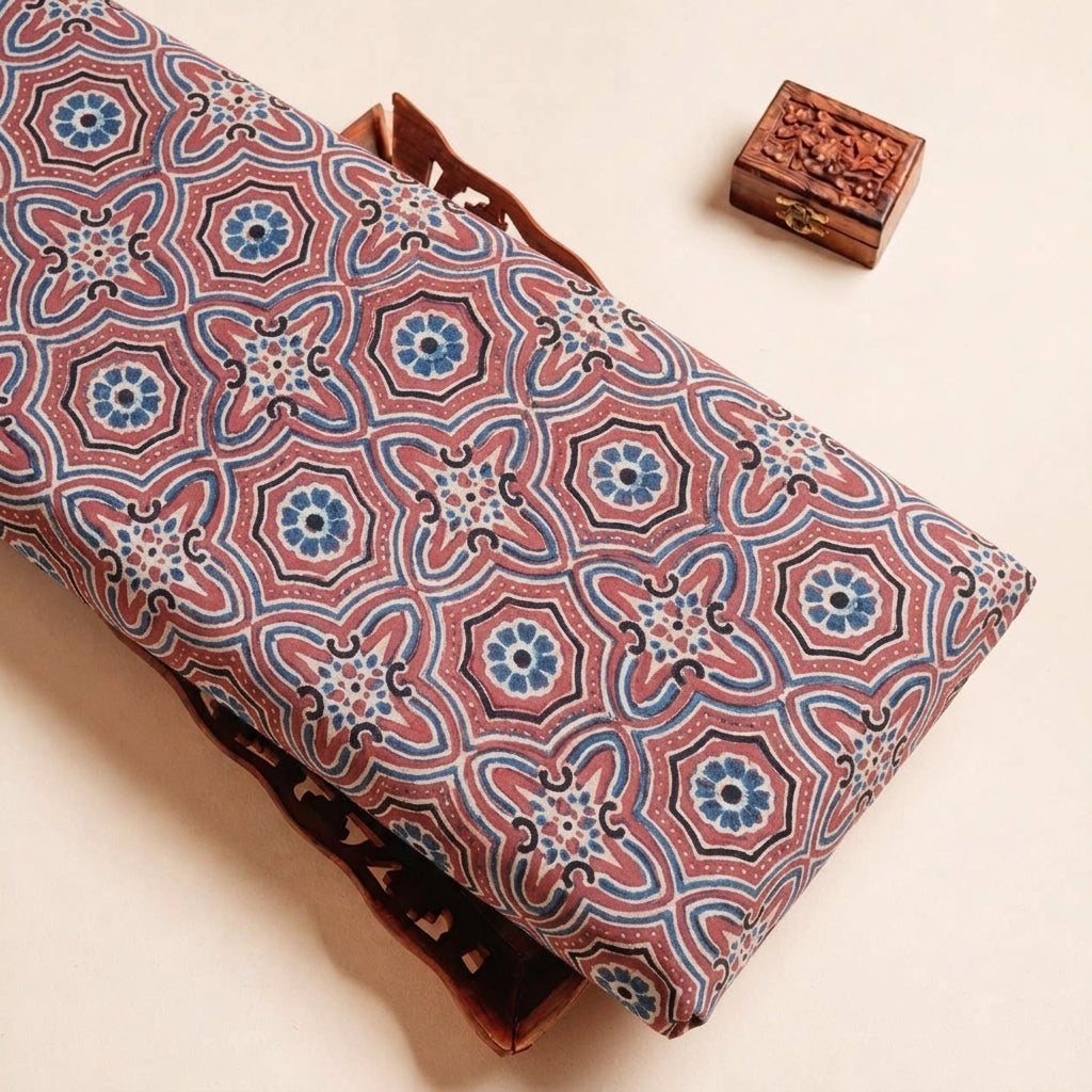 Folded Maroon Ajrakh Modal Silk Fabric Highlighting Block Print and Texture