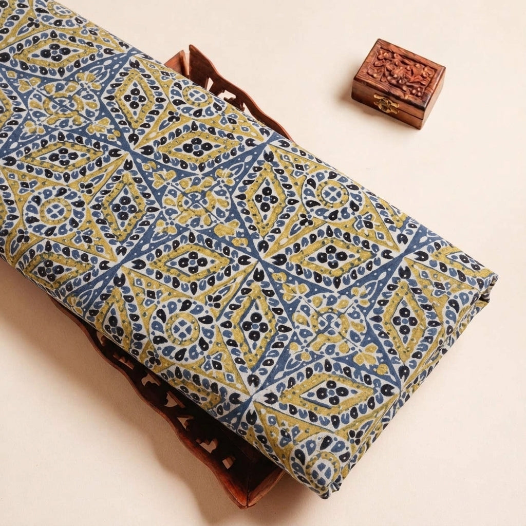 Folded Indigo Ajrakh Modal Silk Fabric Highlighting Silk Block Print and Texture