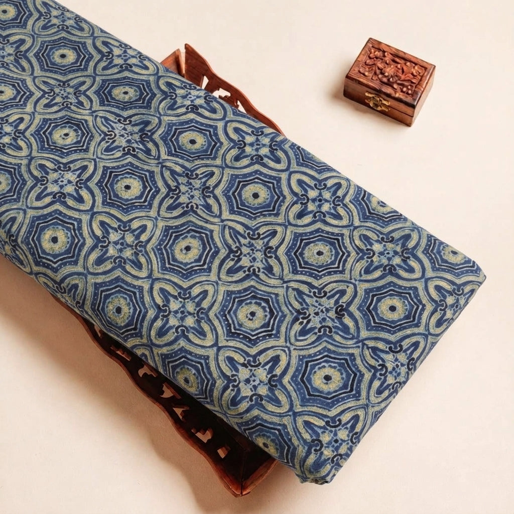 Folded Indigo Ajrakh Modal Silk Fabric Highlighting Silk Block Print and Texture