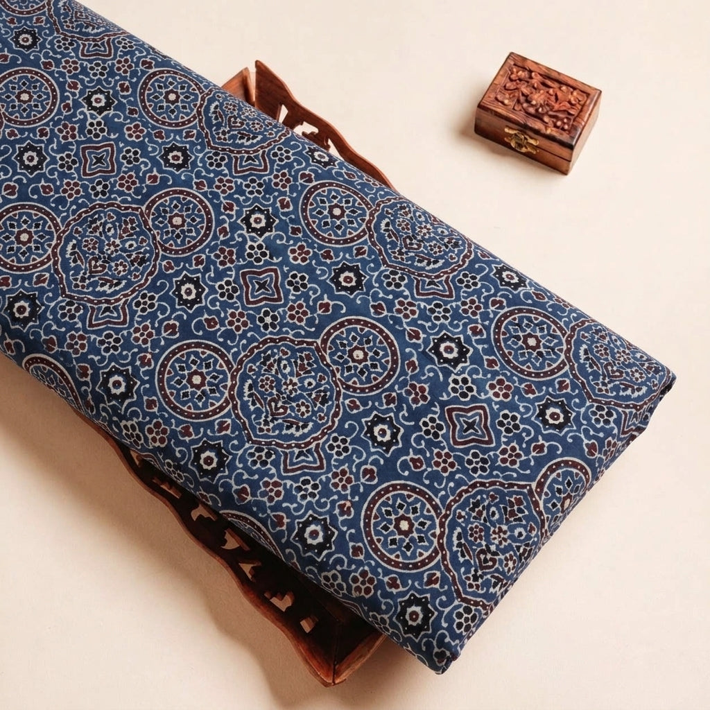 Folded Indigo Ajrakh Modal Silk Fabric Highlighting Silk Block Print and Texture