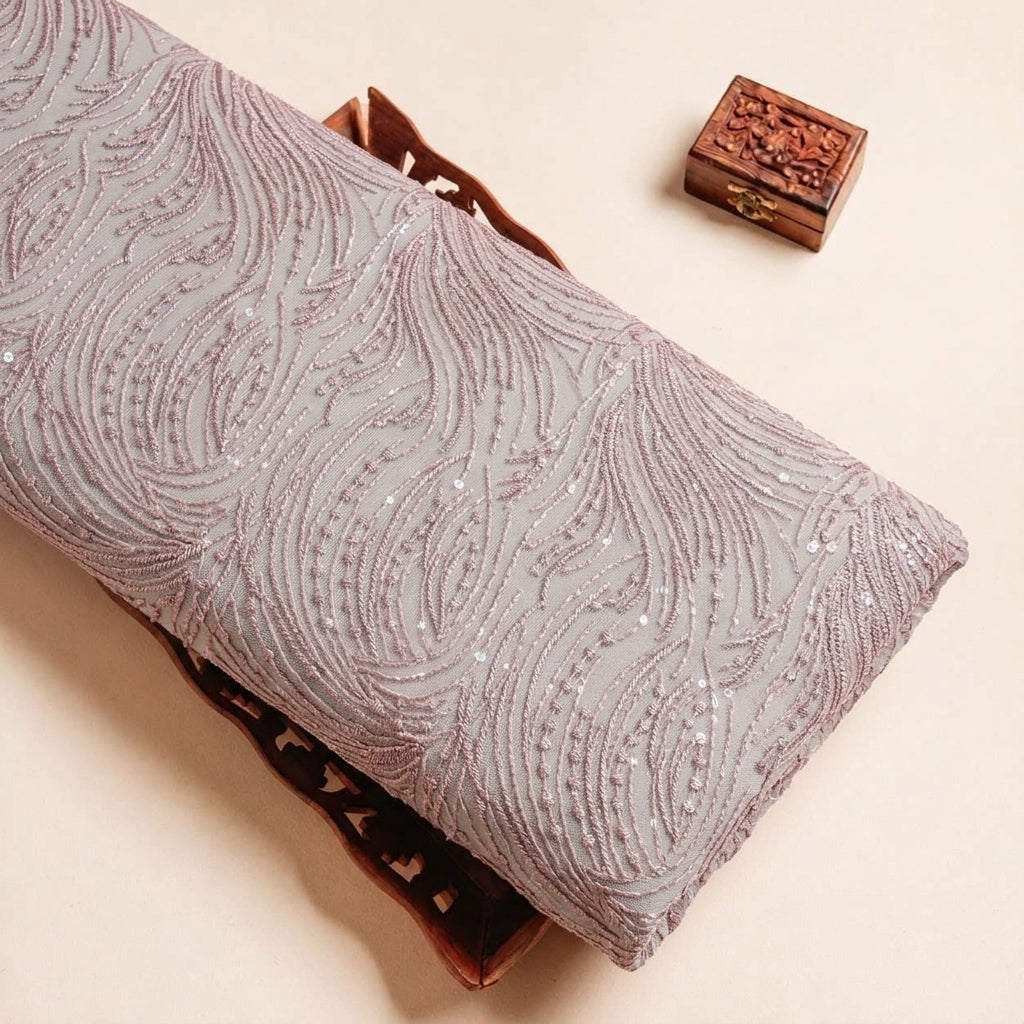 Folded Pink Embroidery Georgette Fabric Highlighting Sequin and Texture