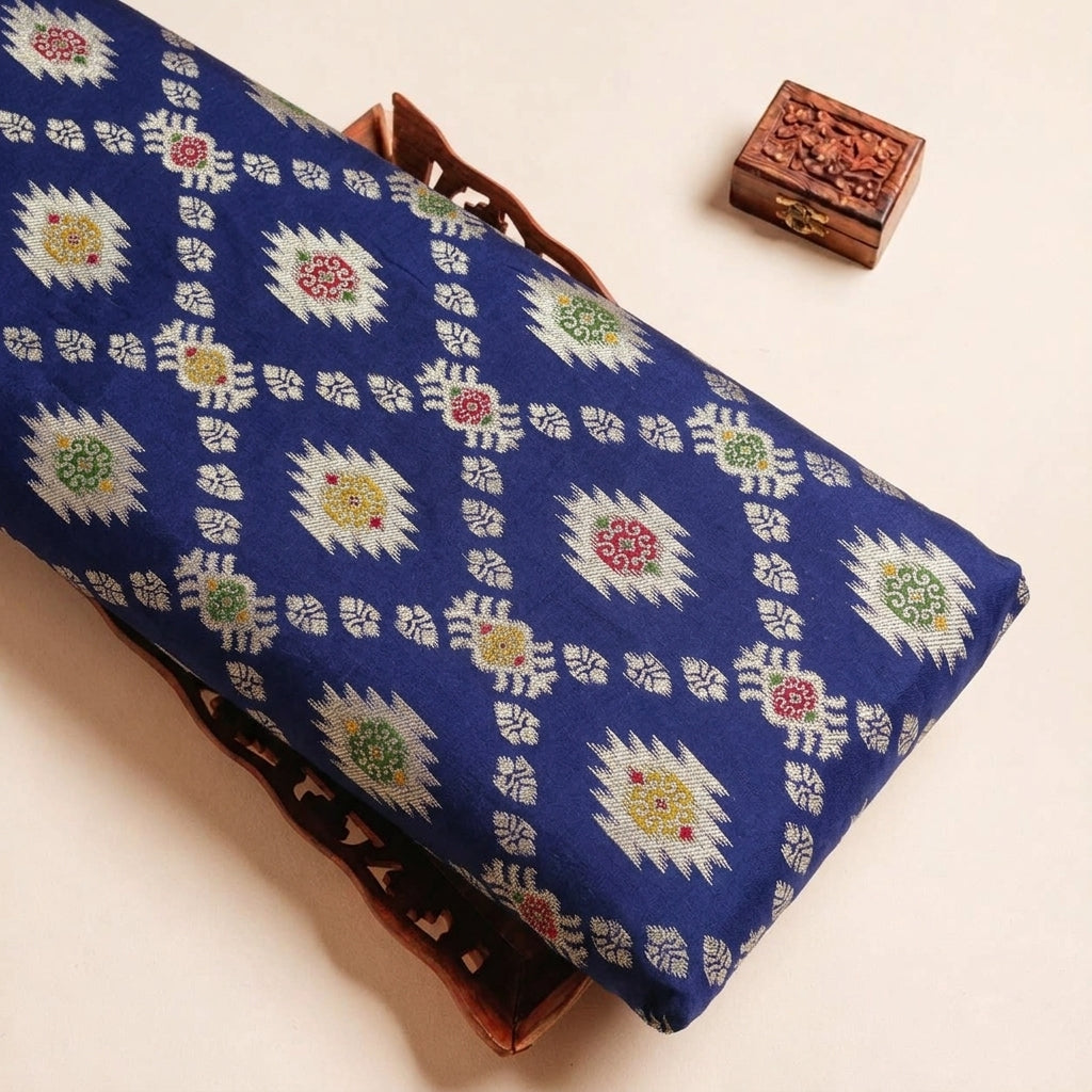 Folded Dark Blue Ikat Semi Banaras Fabric Highlighting and Texture