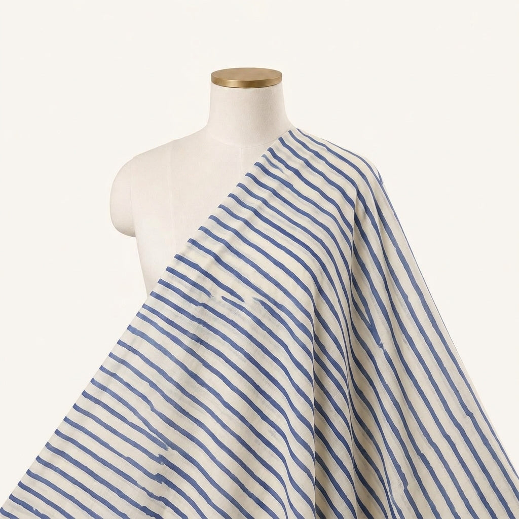 Stripes White Stripes Cotton Fabric Draped as a saree