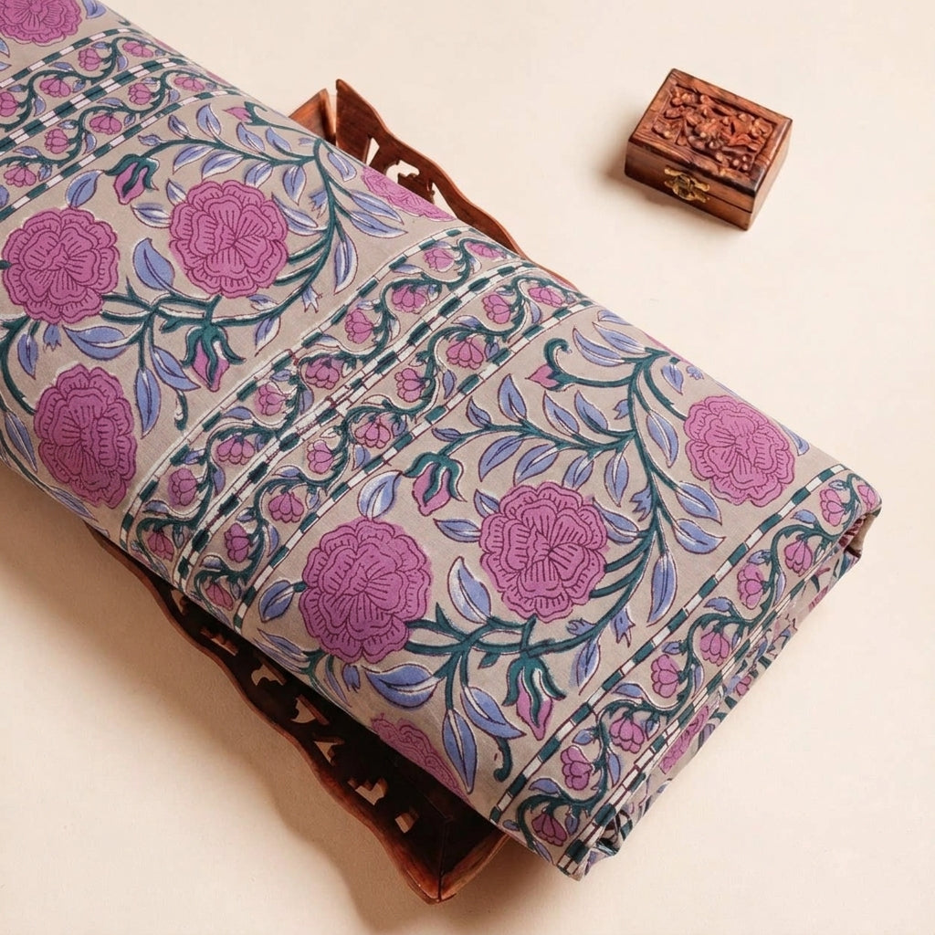 Folded Light Peach Floral Cotton Fabric Highlighting and Texture