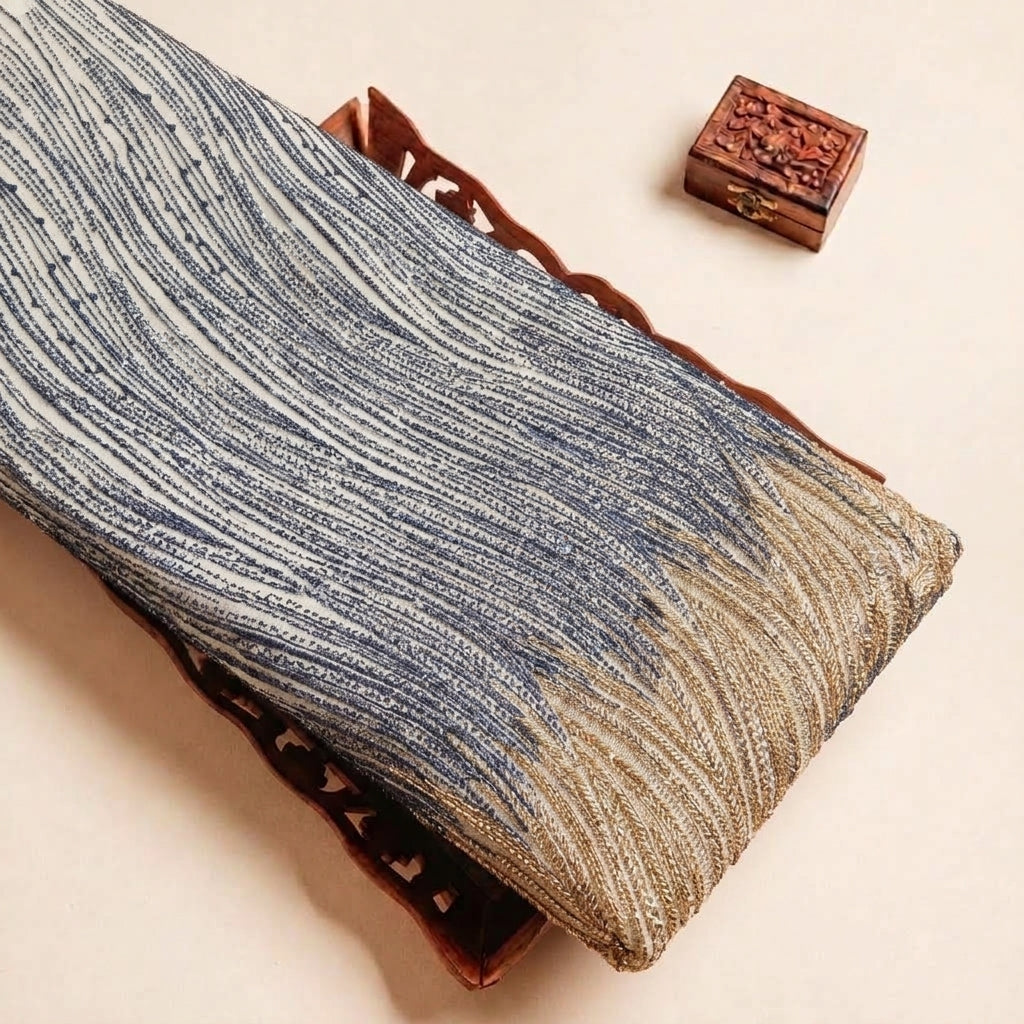 Folded Blue Embroidery Net Fabric Highlighting Sequin Stone Bead and Texture