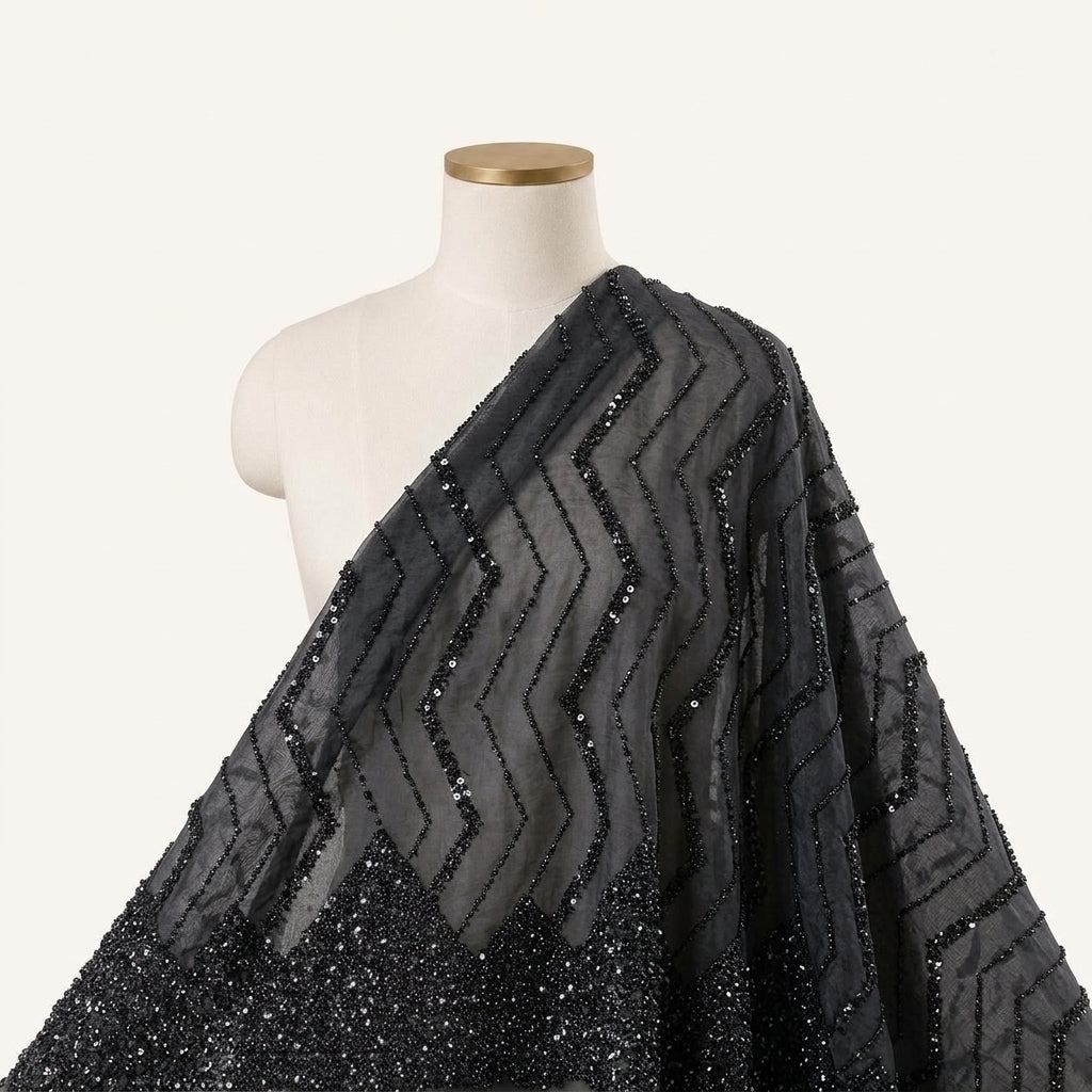 Embroidery Black Embroidery Organza Fabric Draped as a saree