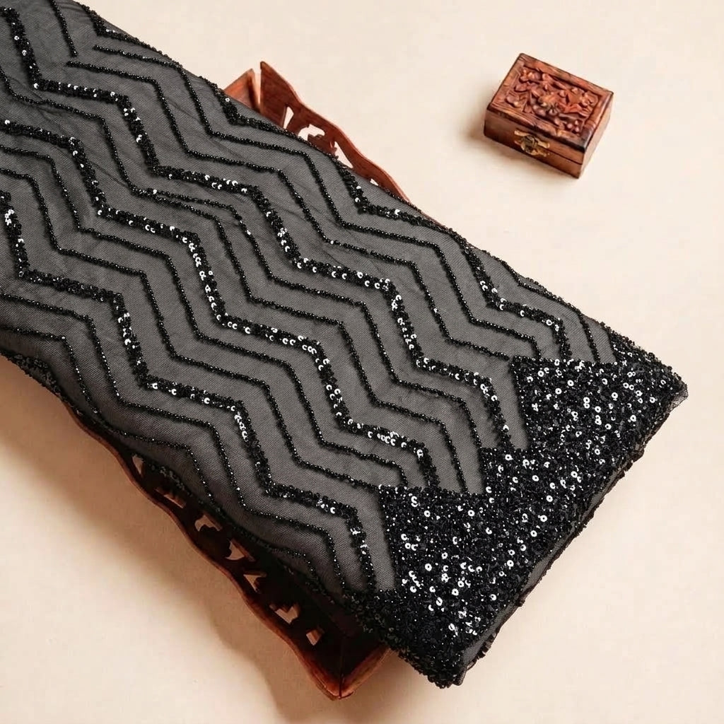 Folded Black Embroidery Organza Fabric Highlighting Stone Chevron and Texture