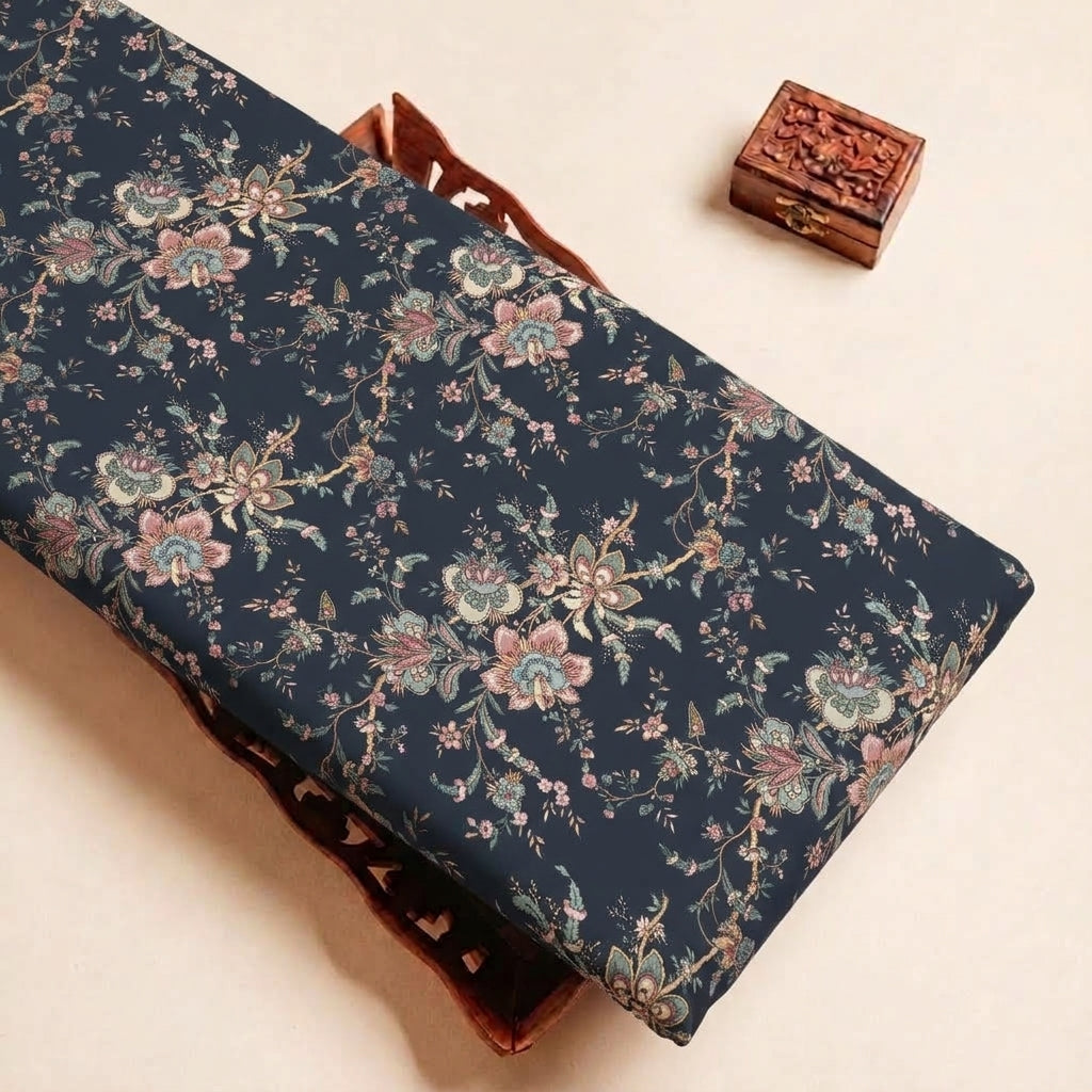 Folded Black Floral Satin Fabric Highlighting Modal and Texture