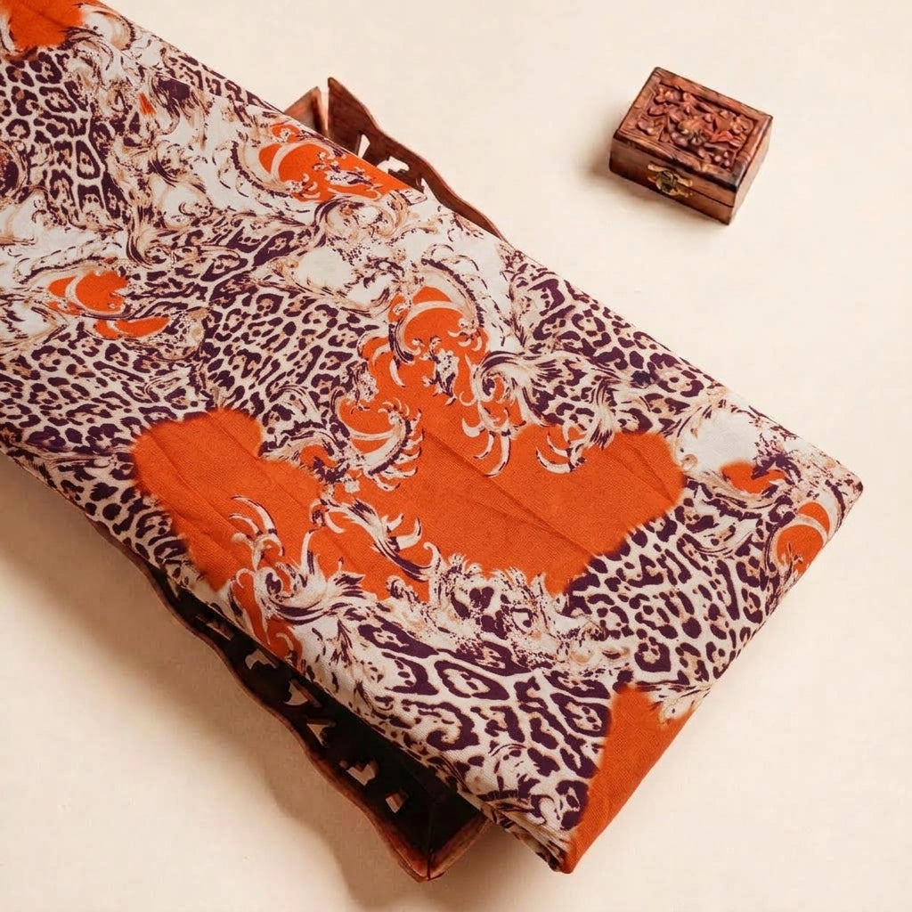 Folded Orange Animal Print Satin Fabric Highlighting Modal and Texture
