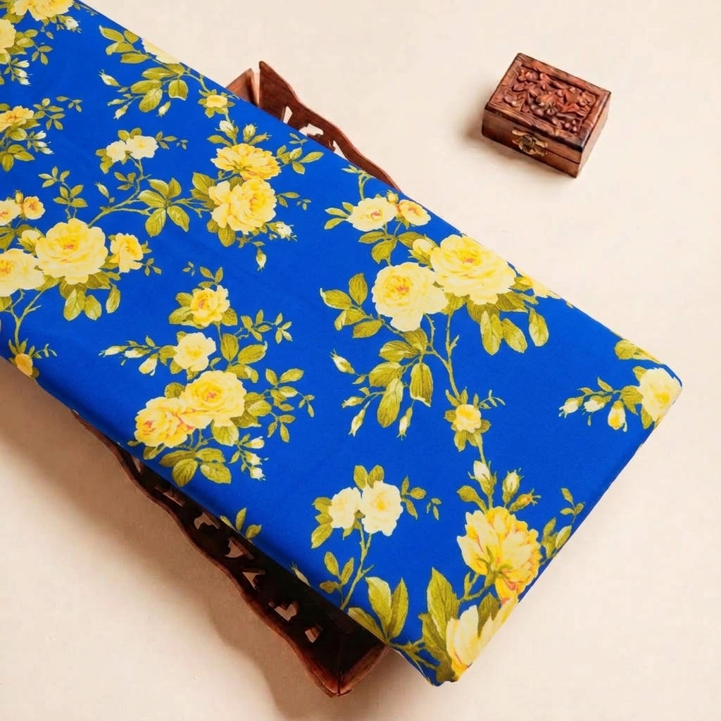 Folded Blue Floral Satin Fabric Highlighting Modal and Texture