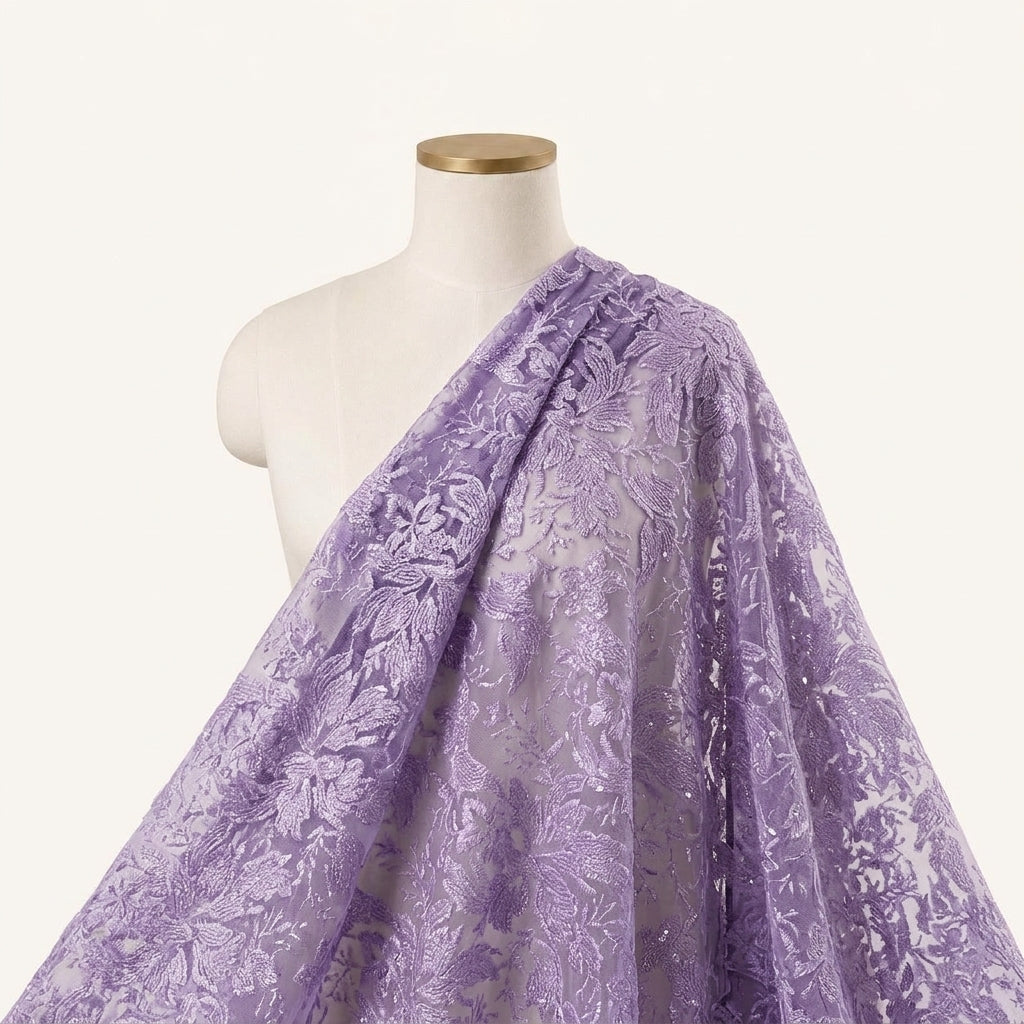 Embroidery Violet Embroidery Net Fabric Draped as a saree