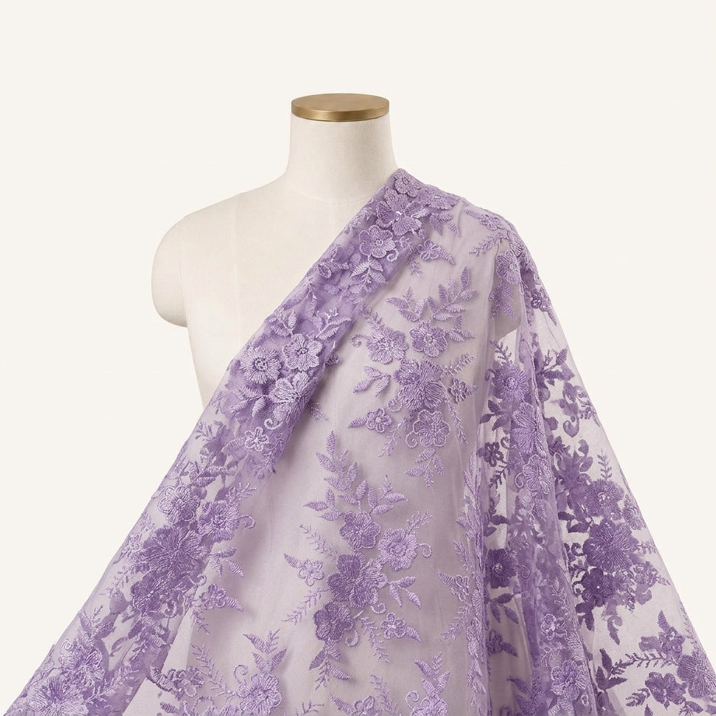 Embroidery Violet Embroidery Net Fabric Draped as a saree