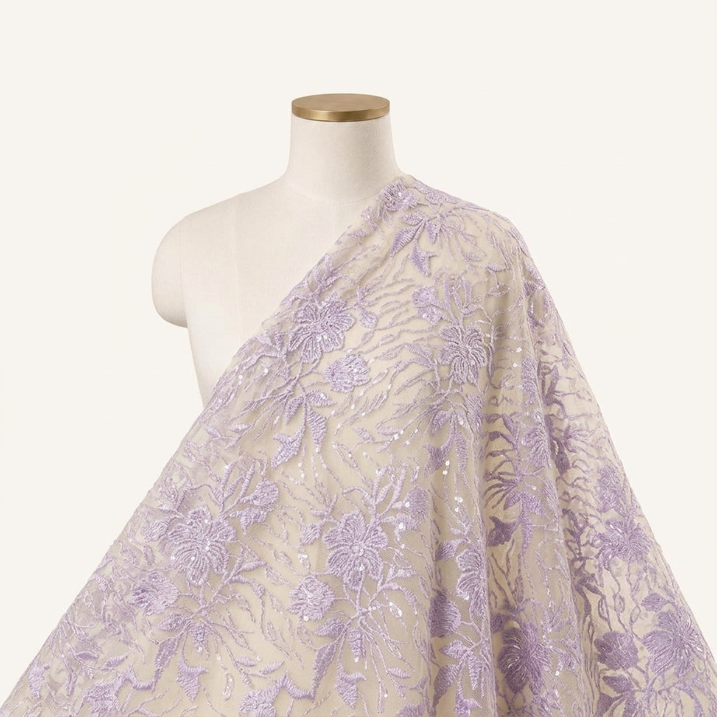 Embroidery Violet Embroidery Net Fabric Draped as a saree
