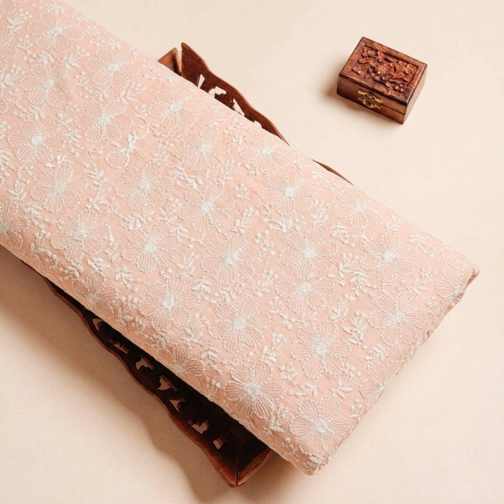 Folded Peach Embroidery Cotton Fabric Highlighting Thread Work Floral and Texture