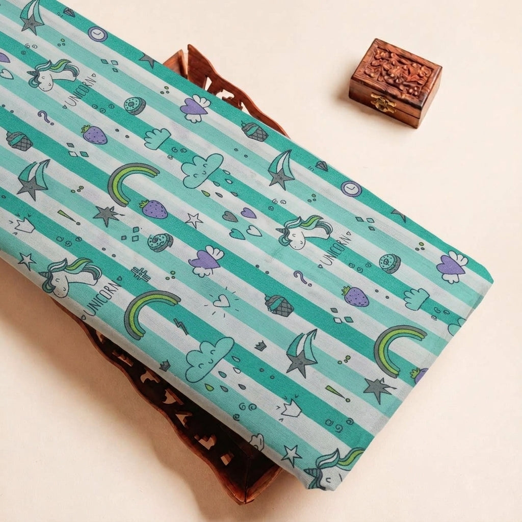 Folded Green Printed Cotton Fabric Highlighting Kids and Texture
