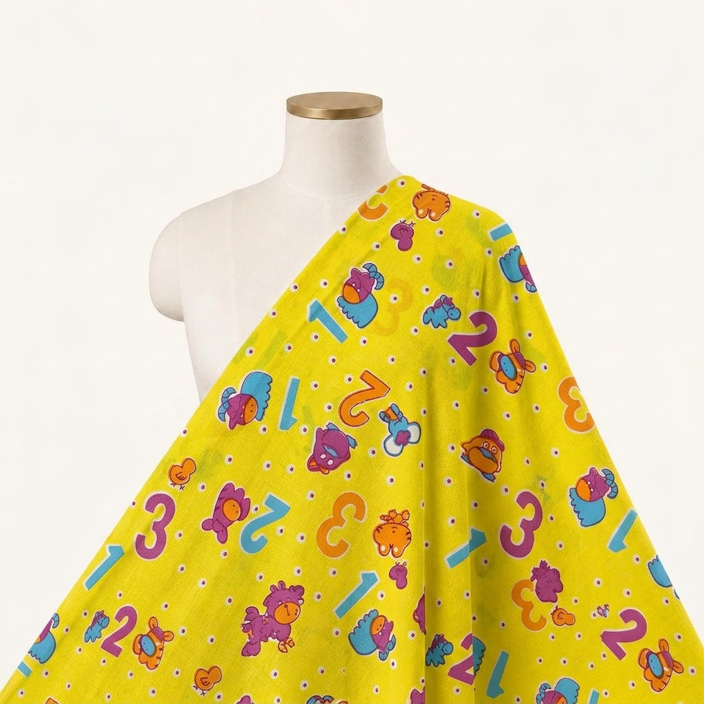 Printed Yellow Printed Cotton Fabric Draped as a saree