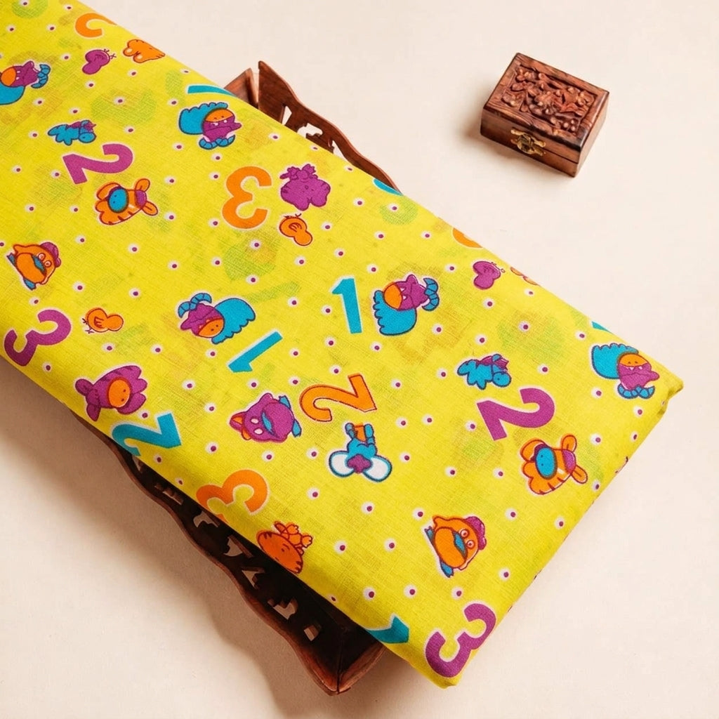 Folded Yellow Printed Cotton Fabric Highlighting Kids and Texture