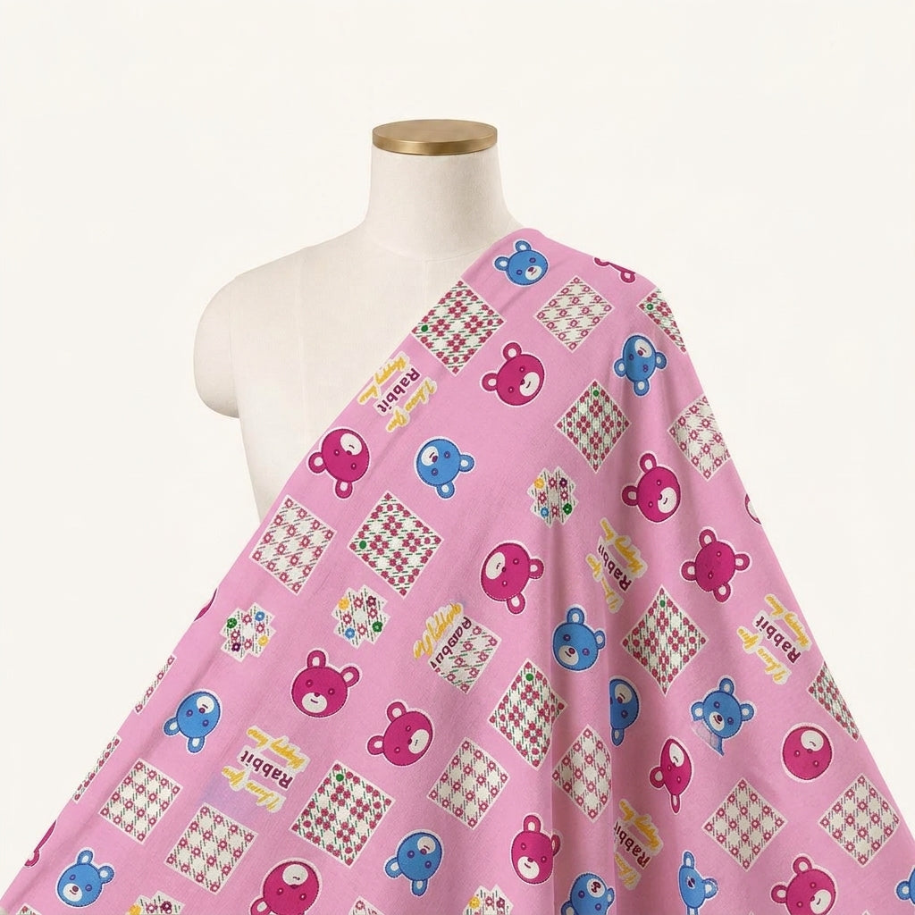 Printed Pink Printed Cotton Fabric Draped as a saree