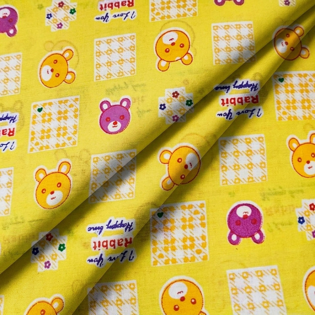 Folded Printed Yellow Printed Cotton Fabric