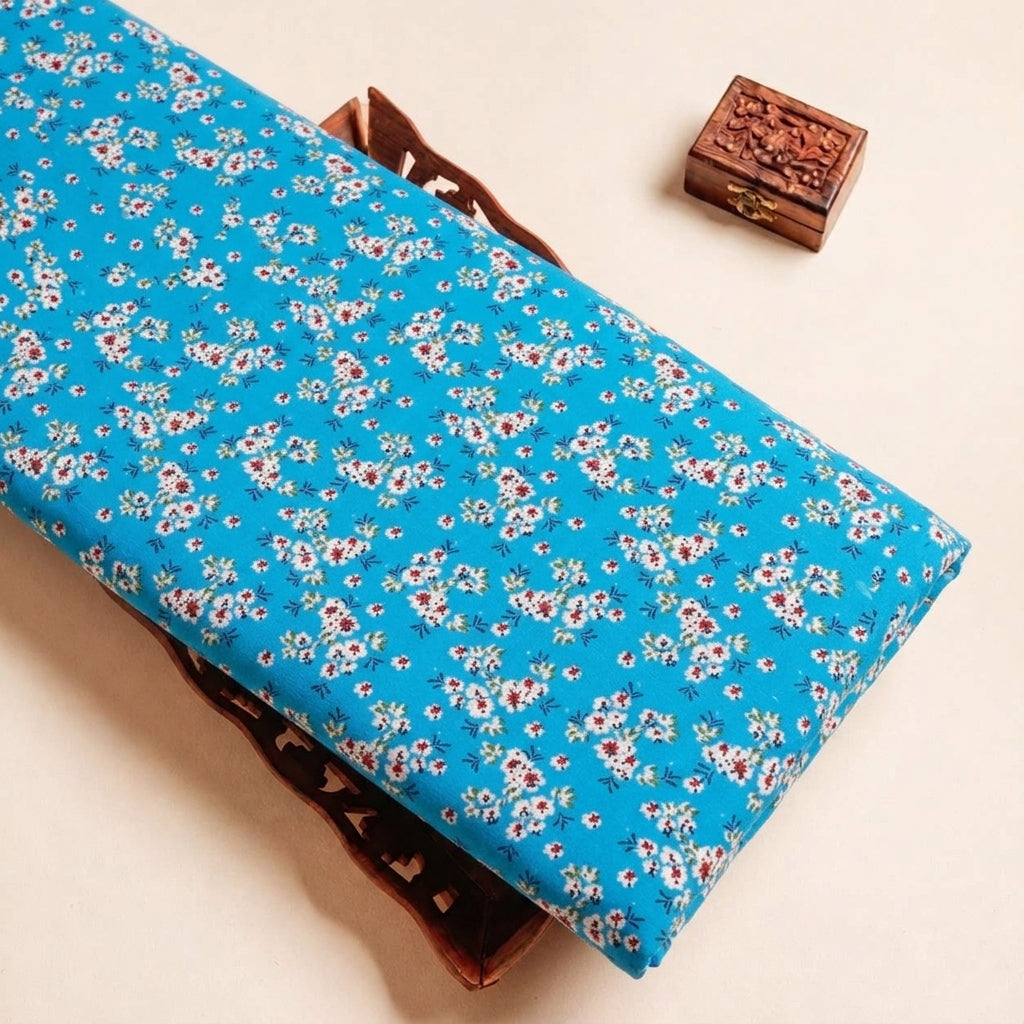 Folded Blue Floral Cotton Fabric Highlighting and Texture