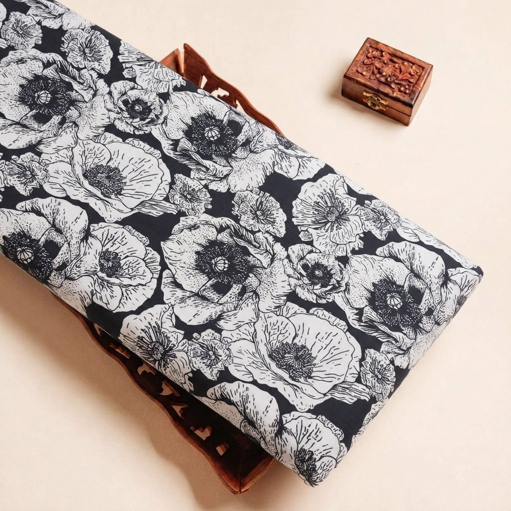 Folded Black Floral Crepe Fabric Highlighting and Texture