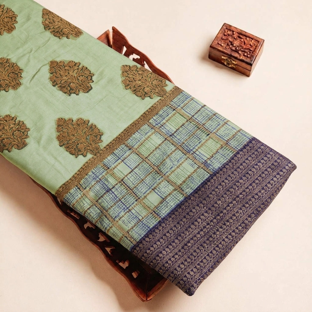 Folded Green Block Print Chanderi Fabric Highlighting Border and Texture