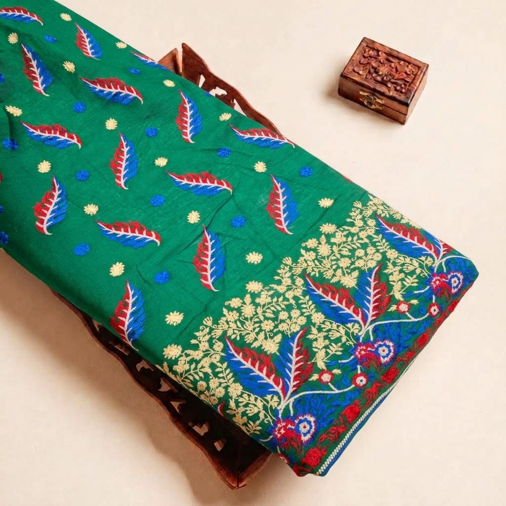 Folded Green Embroidery Cotton Fabric Highlighting Leaf Thread Work Border and Texture