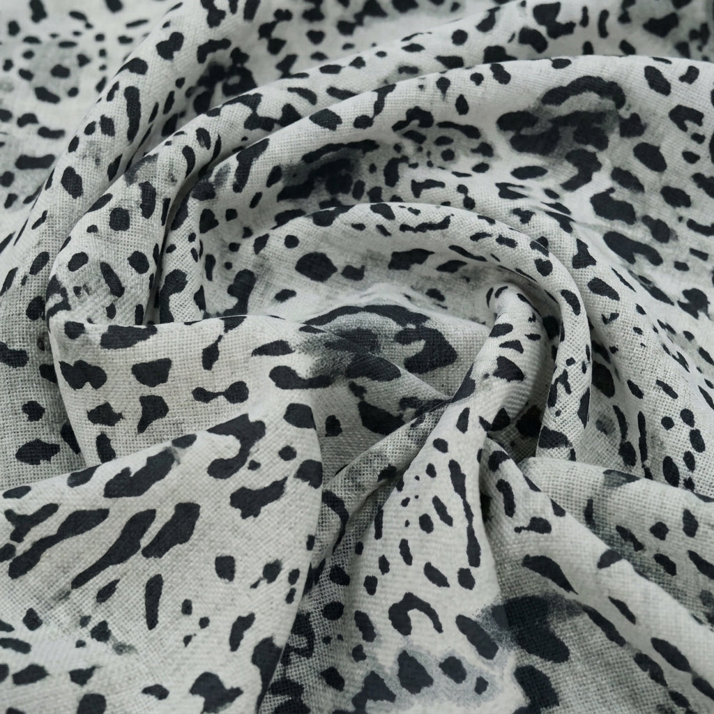 Swirled Animal Print White Animal Print Lycra Fabric