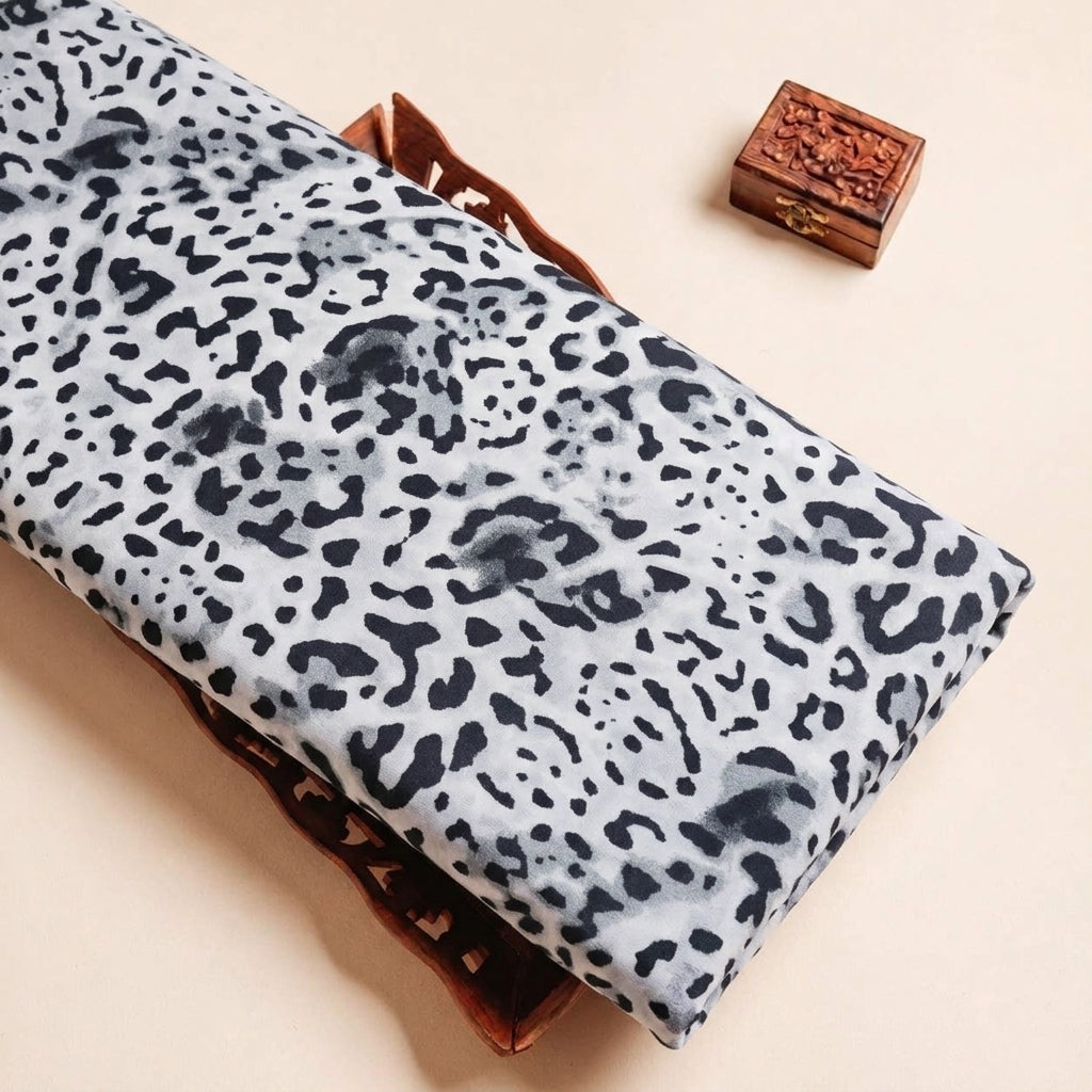 Folded White Animal Print Lycra Fabric Highlighting and Texture